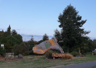 Scenic landscape of The Gumboot Country, a unique stop on our Private Transfers in New Zealand